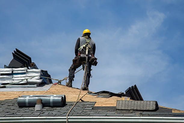 Professional Flat Roof Repair technician working in Hammond, OR